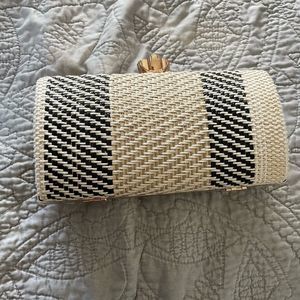 Black and cream woven clutch